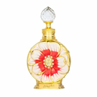 Bouteille de parfum décorative avec motif floral.